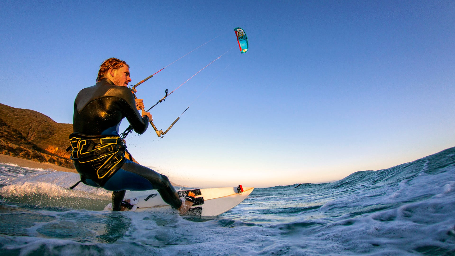 man kitesurfing